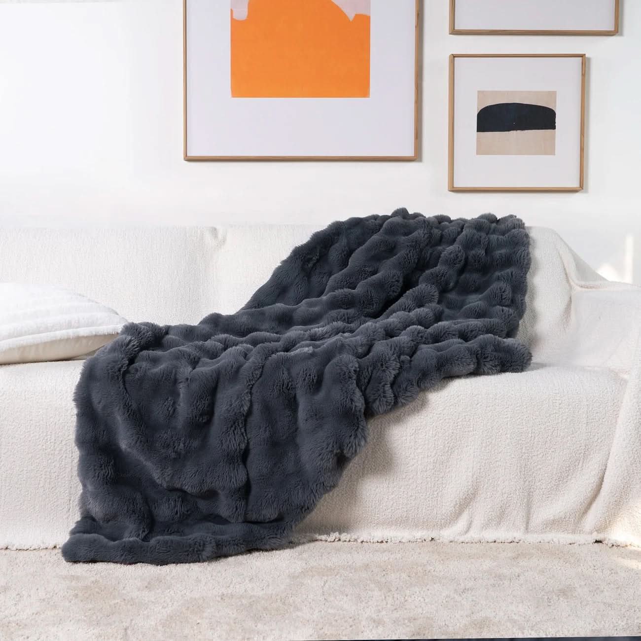 Light blue plush faux fur throw blanket with chunky minimalist texture, double-sided for couch or bed