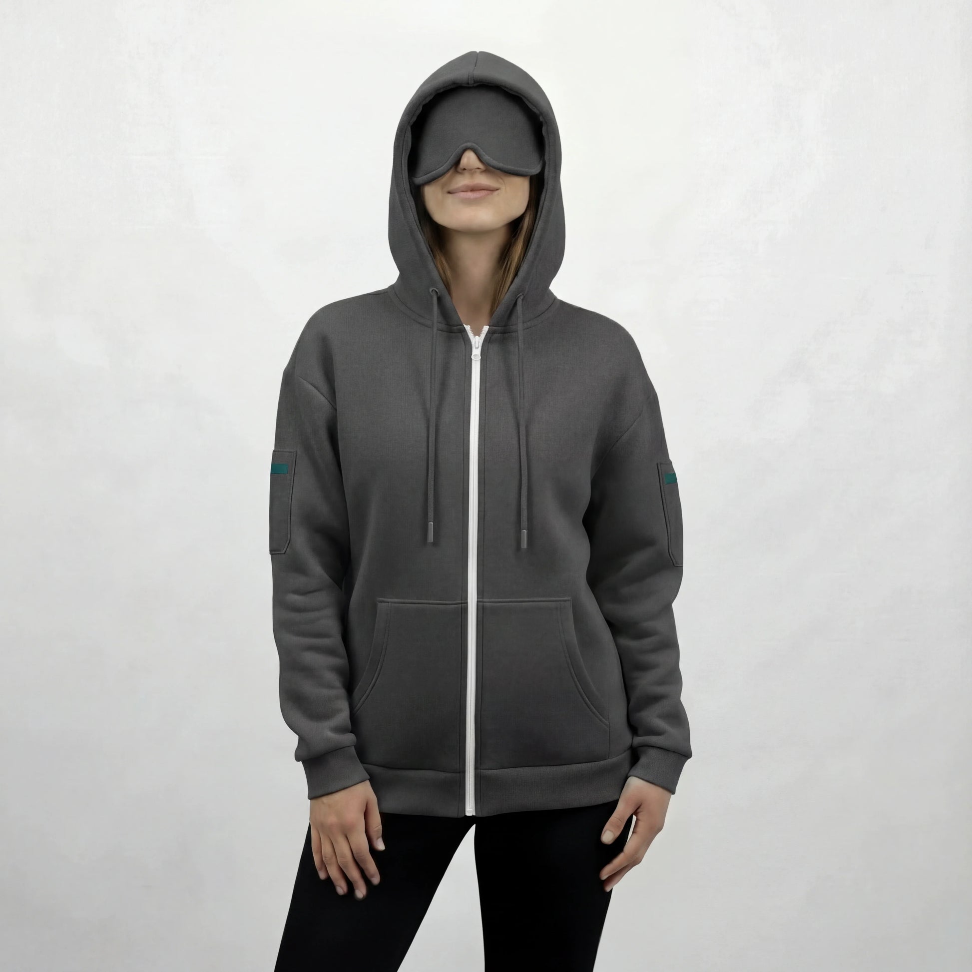 Gray travel hoodie with built-in eye mask hood, cozy oversized fit for frequent flyers