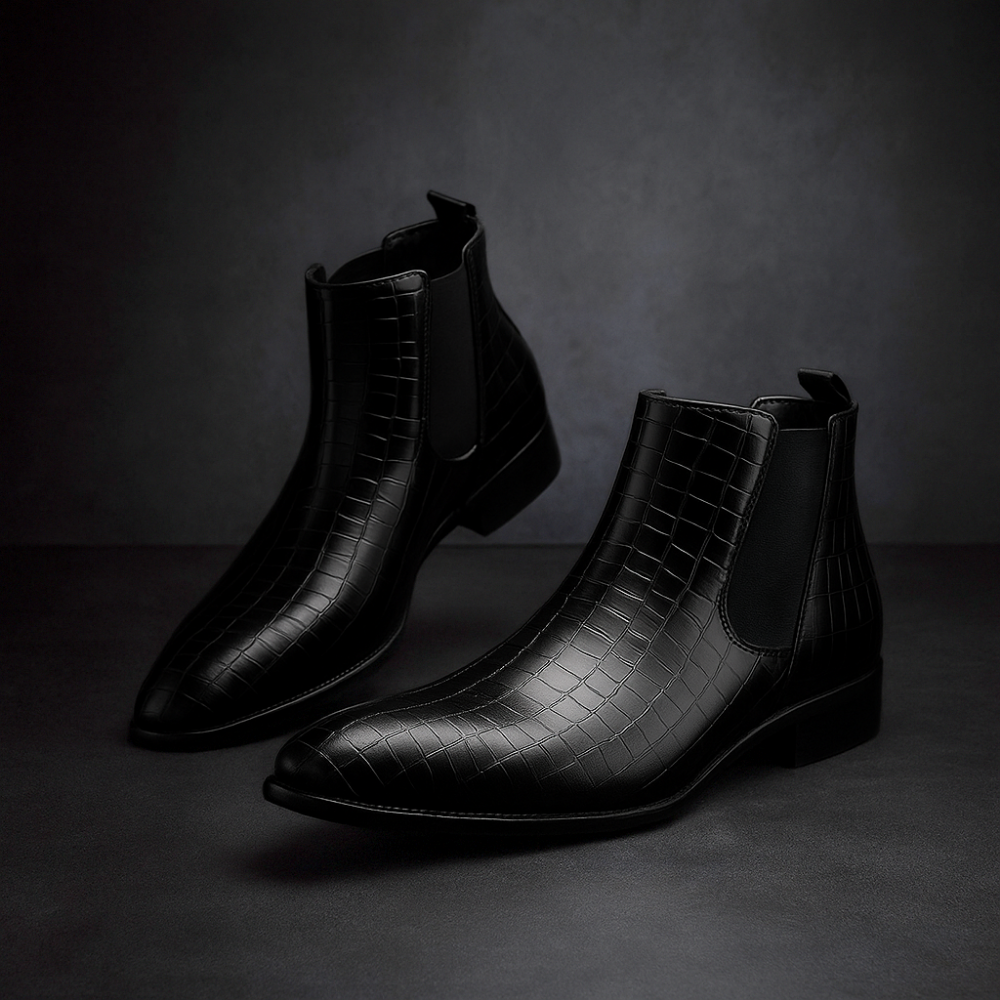 Men's black crocodile embossed Chelsea boots with elastic side panels and streamlined silhouette