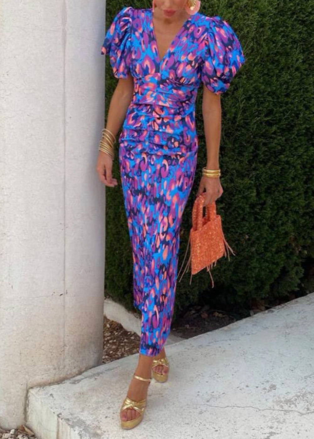 Vibrant multicolor puff sleeve dress with gathered waist and V-neckline for bold occasion wear