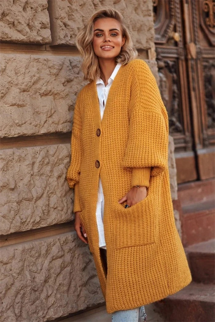Women's oversized long knit coat chic silhouette with button closure and large side pockets