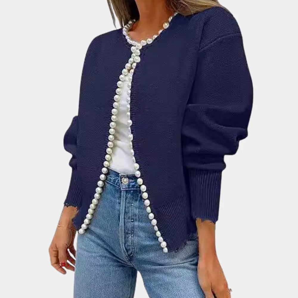 Women's relaxed fit soft knit cardigan with long sleeves and pearl buttons for modern layering