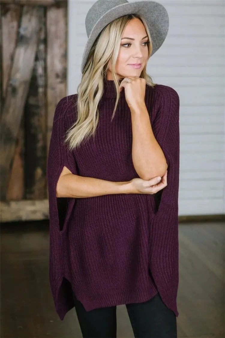 Women's oversized knit poncho high turtleneck wide sleeves cozy warm draped silhouette