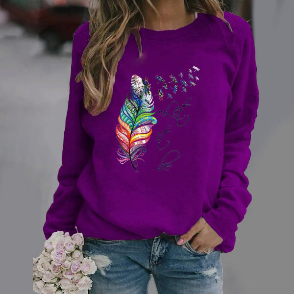Women's relaxed fit crew neck sweatshirt with feather print and text graphic detail