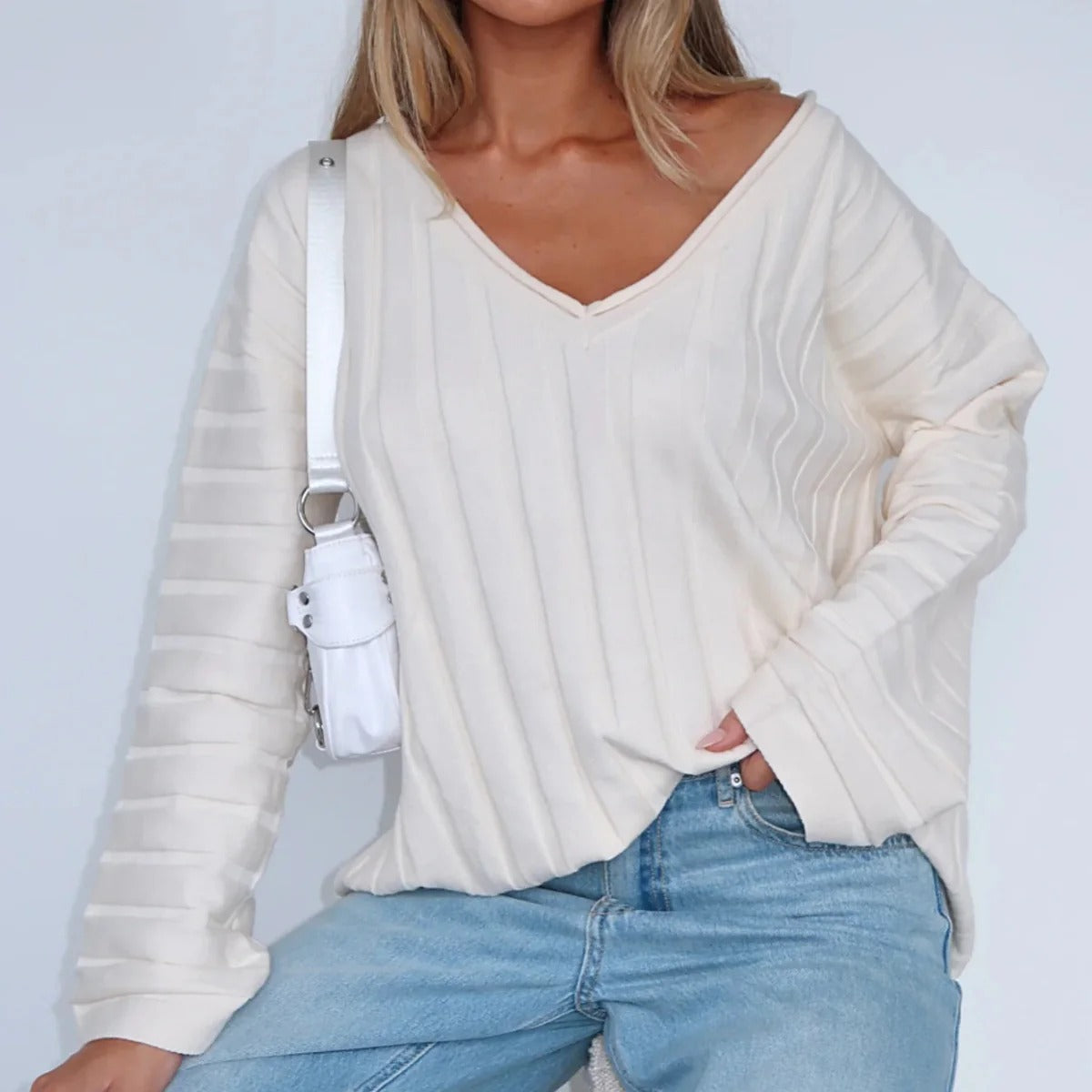 Women's relaxed-fit v-neck knit sweater in soft wool blend with ribbed long sleeves timeless style