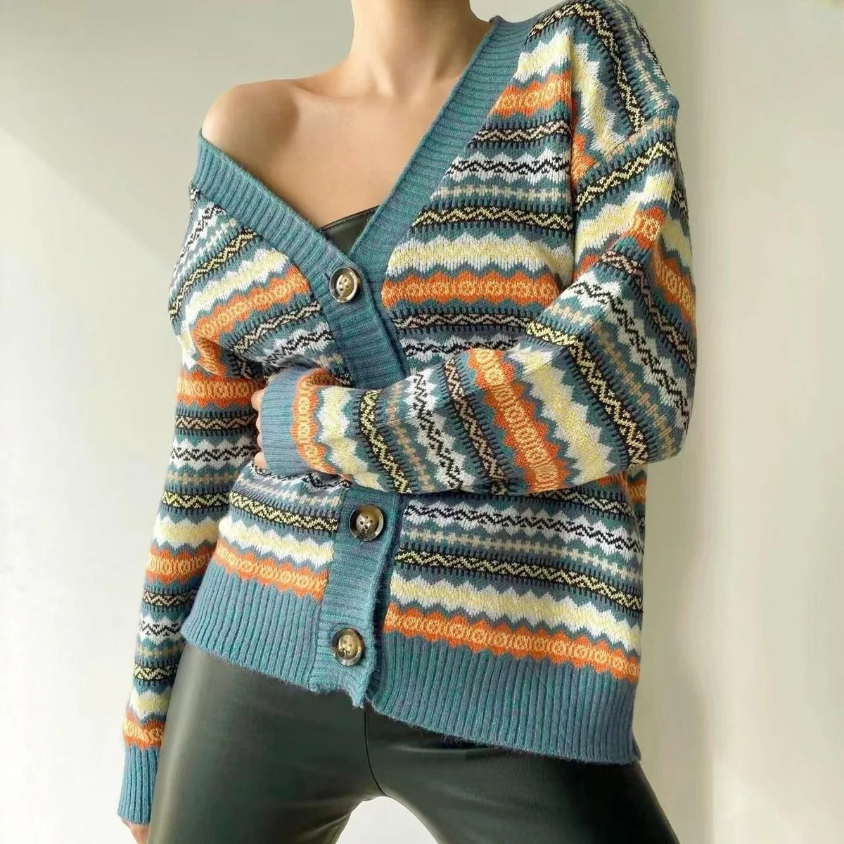 Women's relaxed-fit knit cardigan with V-neck, button closure, and patterned design for everyday style
