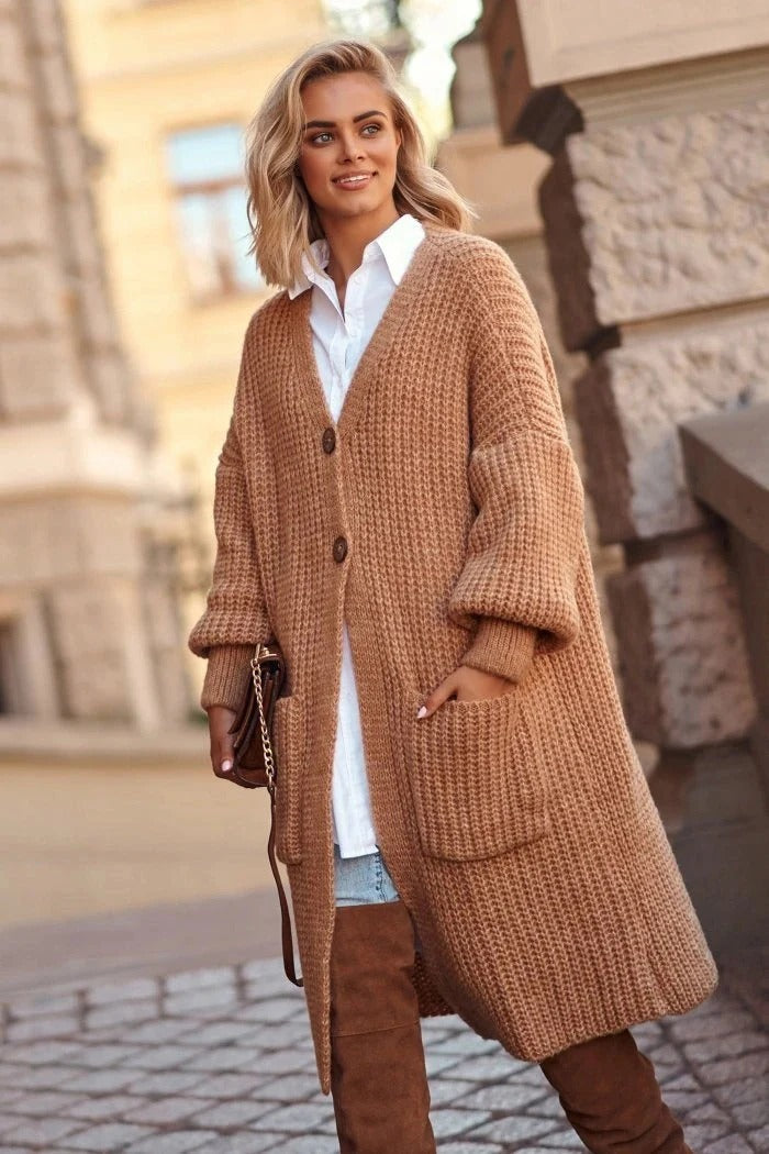 Women's oversized long knit coat with button closure, large pockets, chic relaxed silhouette