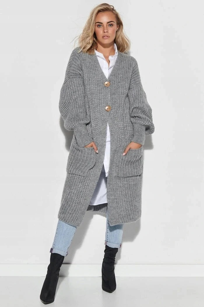 Women's oversized long knit coat with button closure, large pockets, chic relaxed silhouette