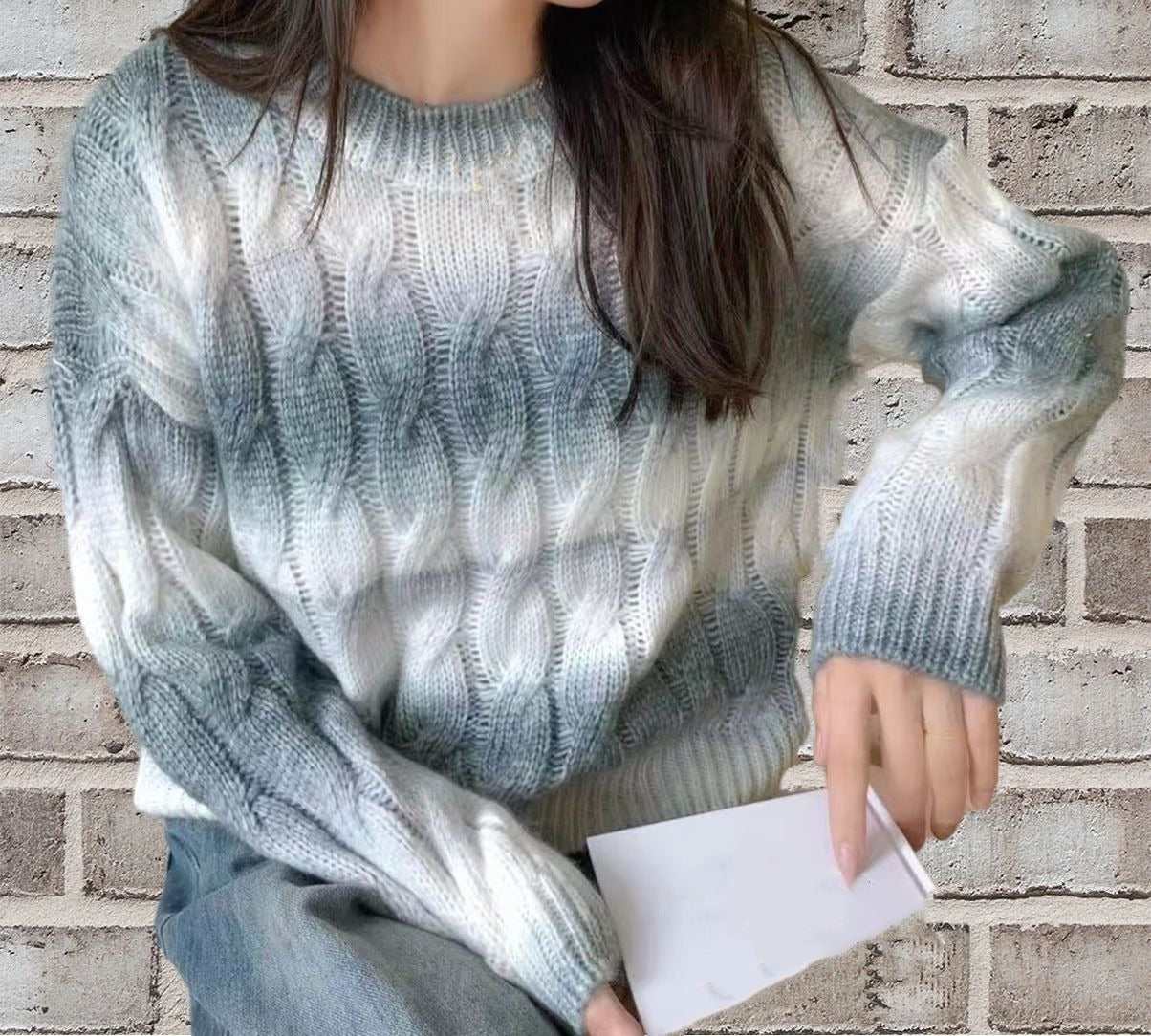 Women's relaxed-fit cable knit sweater, soft warm neutral tone, long sleeves, casual everyday style