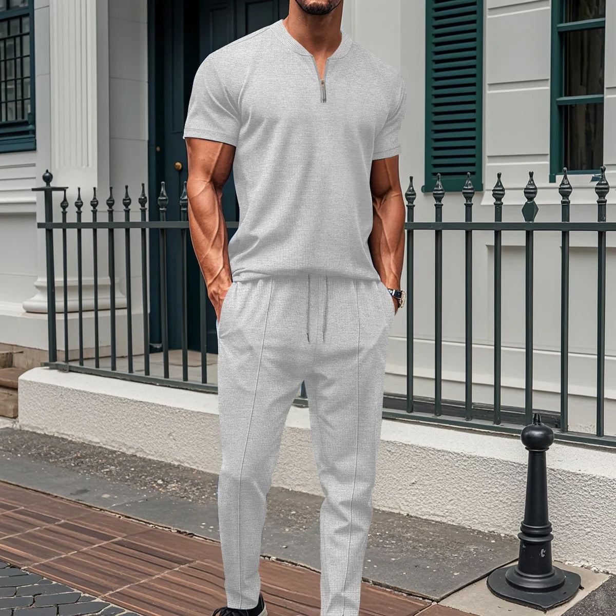 Men's slim fit gray training set with zip top and elastic waist pants for gym workouts