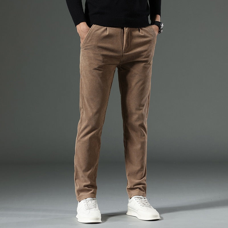 Black corduroy slim straight leg pants with flat front design for a polished modern look