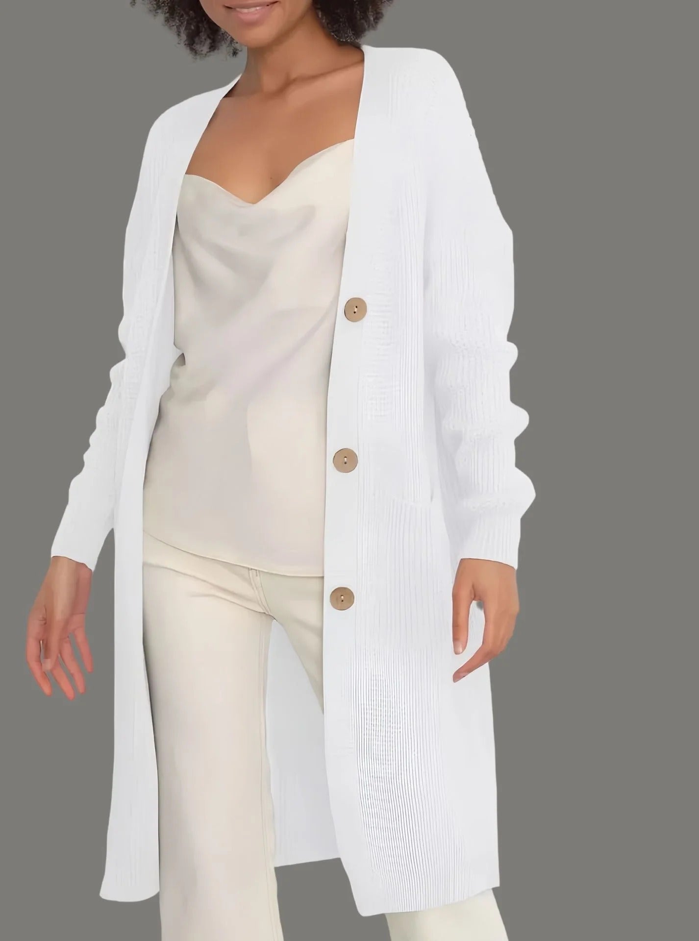 Women's long relaxed-fit soft knit cardigan with button closure and pockets for effortless everyday styling
