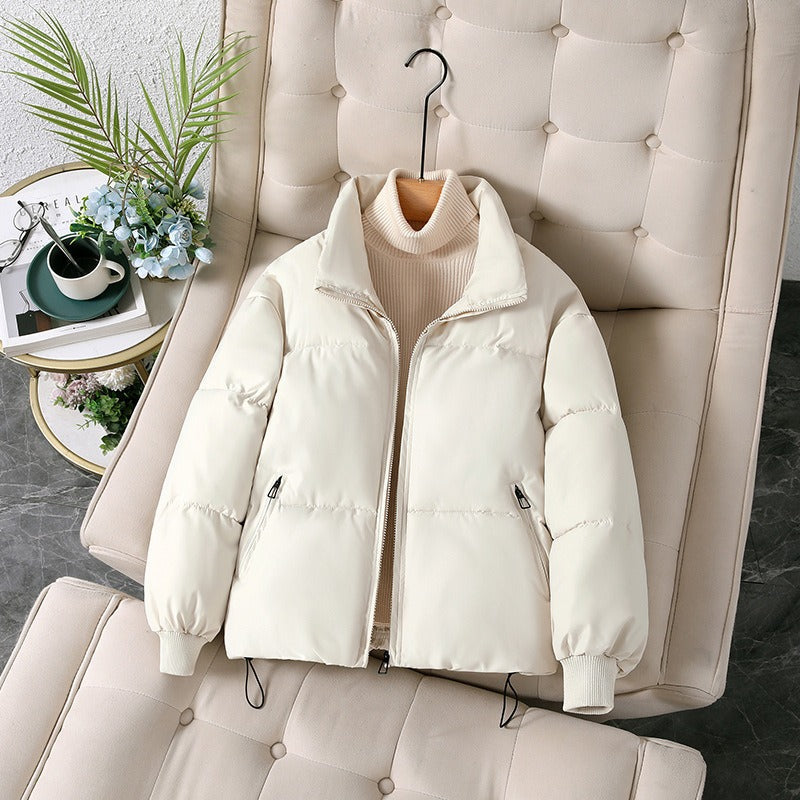 Women's oversized woven jacket with stand-up collar, hip-length cut, relaxed fit for effortless layering