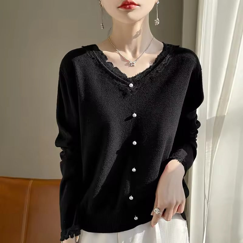 Women's wool blend relaxed fit sweater in neutral tone with delicate lace V-neck detail