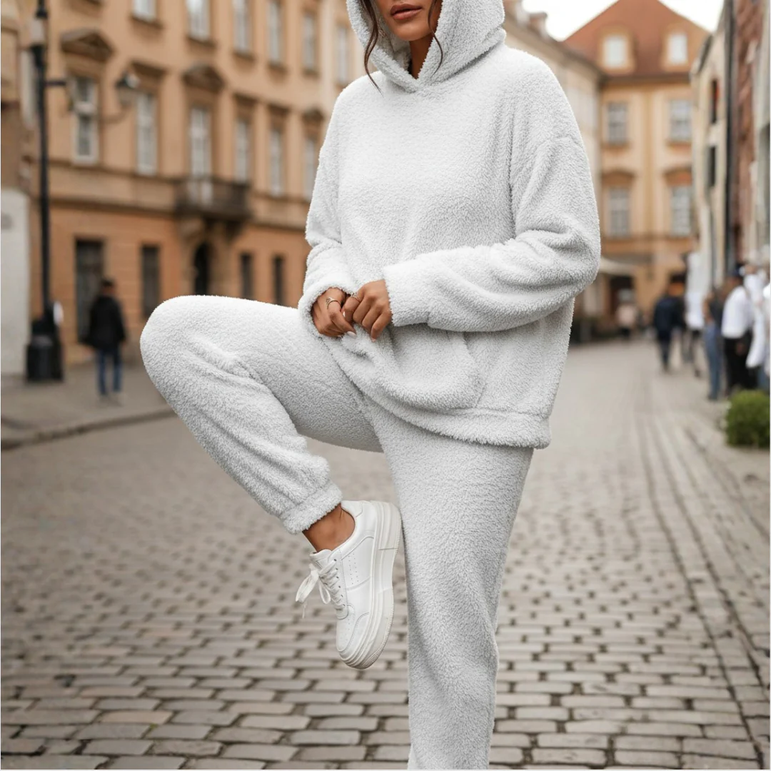 Women's fleece hoodie and pants lounge set in cozy two-piece style with matching hood for warmth