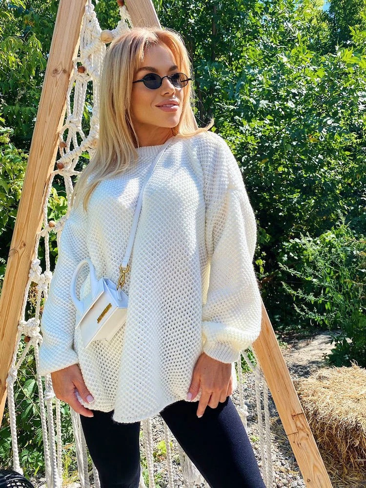 Women's oversized crewneck knit pullover in cozy wool-blend texture for casual everyday style