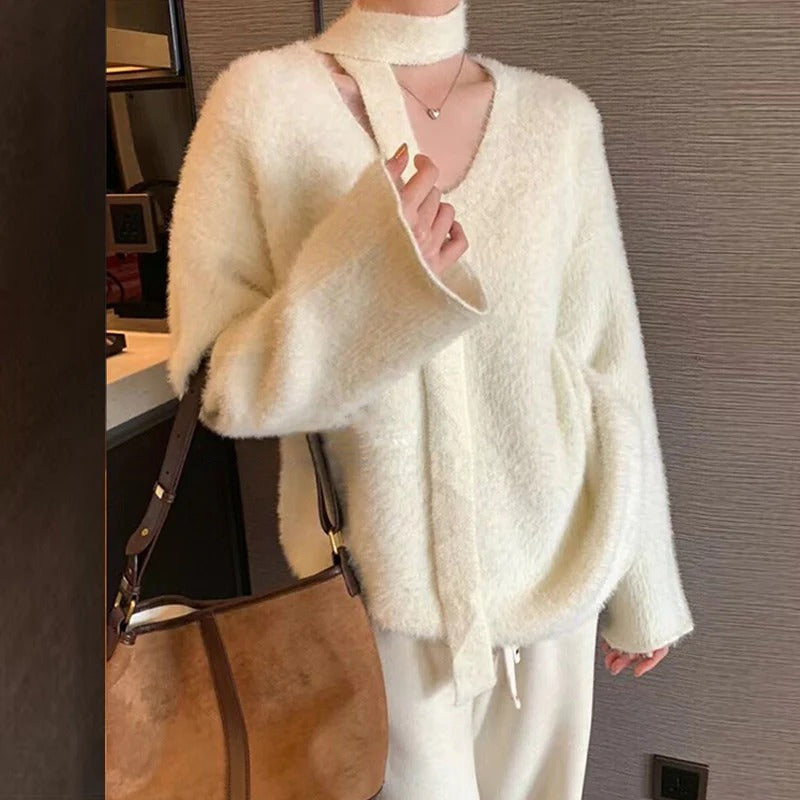 Oversized wool knit pullover deep V-neck with integrated scarf detail cozy chic style