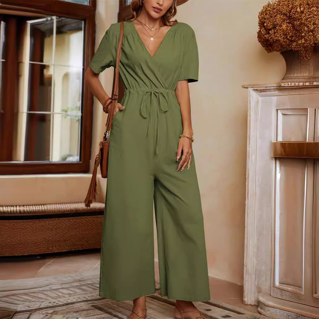 Women's relaxed-fit jumpsuit with tie belt, side pockets, and casual everyday silhouette