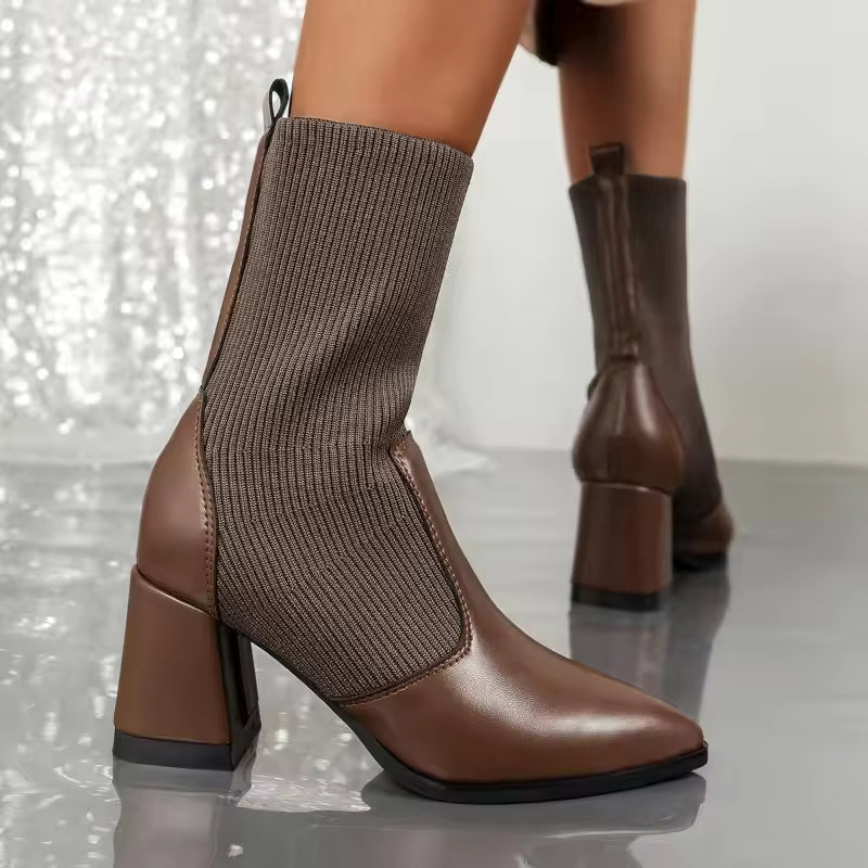 Women's black pointed toe ankle boots with knitted sock upper and chic block heel for city style
