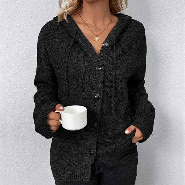 Women's oversized hooded knit cardigan with button front, ribbed trim, and cozy relaxed silhouette