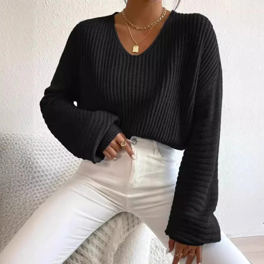 Women's relaxed-fit V-neck rib knit sweater in neutral tone with long sleeves for effortless everyday style