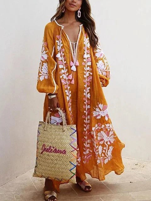 Women's flowy kaftan dress in breathable cotton with delicate floral embroidery, relaxed silhouette