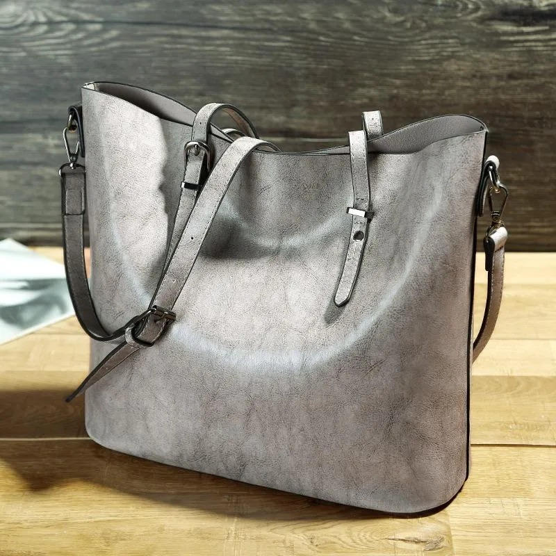 Women's vintage PU leather tote bag in classic brown with wrinkle-resistant exterior for everyday use