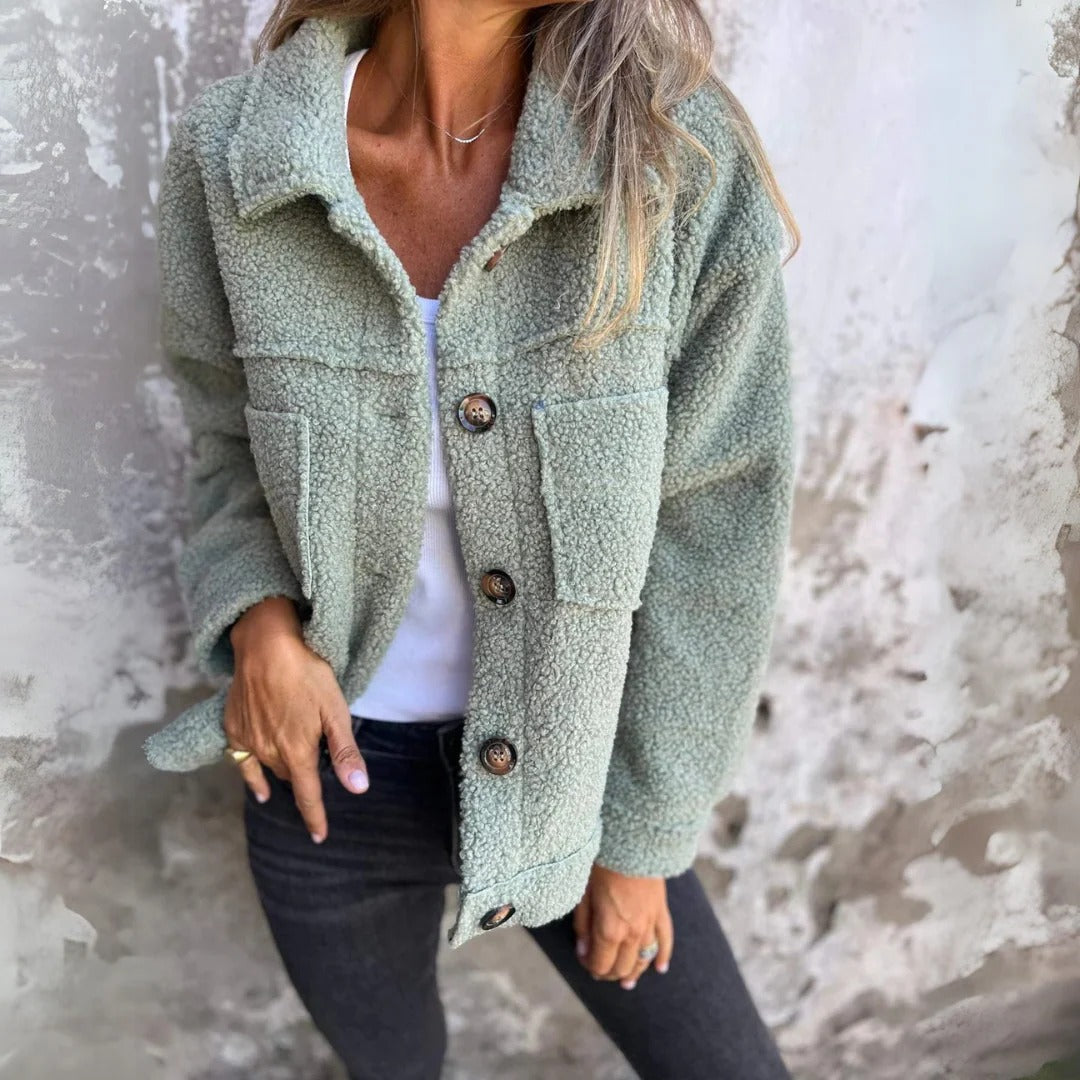 Women's relaxed fit wool texture coat with wide lapel, oversized buttons, and patch pockets