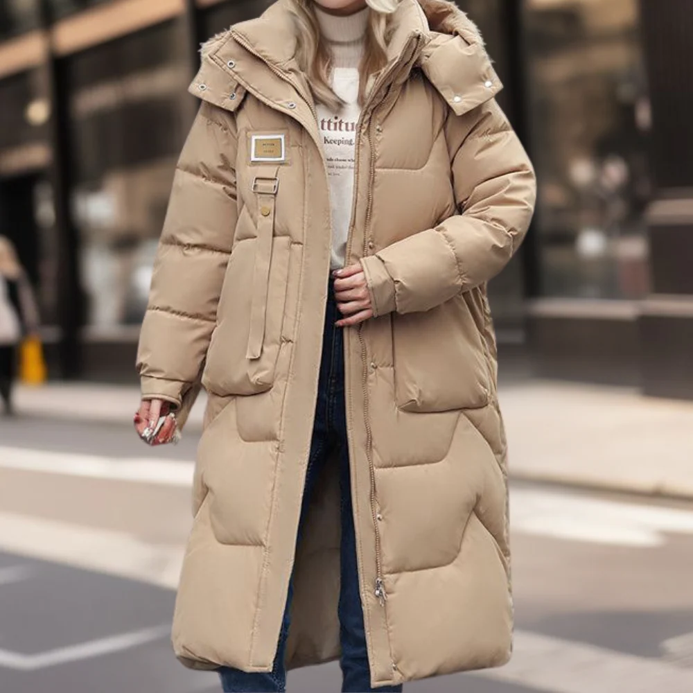 Women's oversized full-length quilted coat with hood, water-resistant warmth in cozy neutral tones