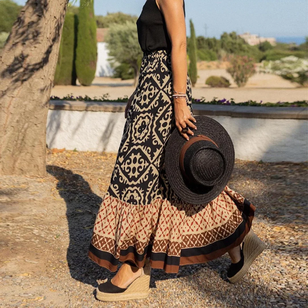 Women's high waisted tiered boho maxi skirt in lightweight geometric print fabric