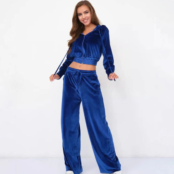 Women's gray fleece loungewear set with drawstring hoodie and wide-leg pants, relaxed fit
