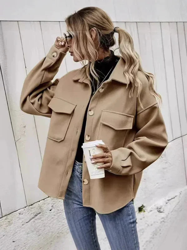 Women's oversized wool coat button-front notched collar flap pockets classic refined silhouette