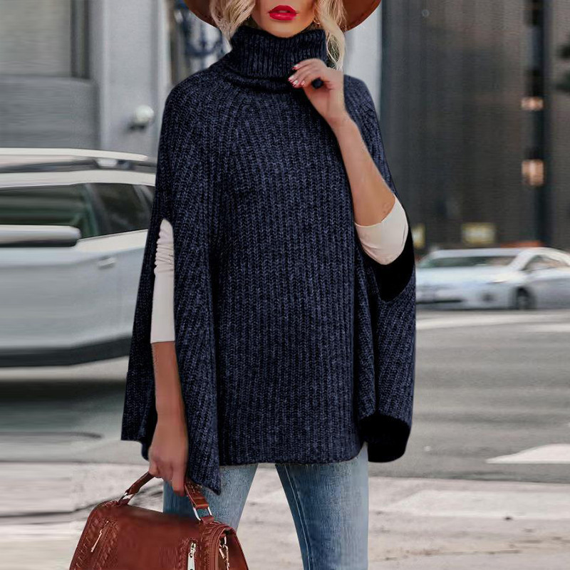 Women's loose-fit wool blend knit cape high neck arm slits cozy luxe layer modern style