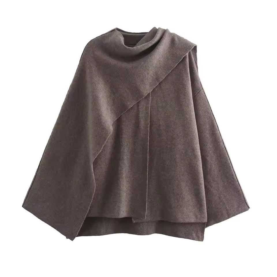 Women's oversized wool knit coat in neutral tone with asymmetric shawl collar for cozy fall style