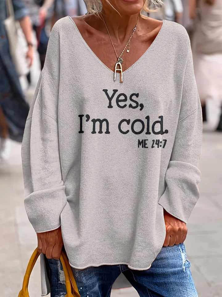 Women's soft knit oversized V-neck sweater with relaxed drop shoulders, casual everyday essential