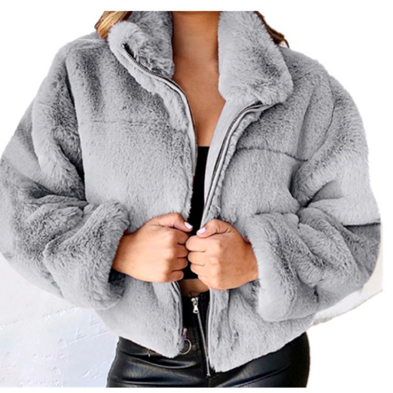 Women's beige faux fur cropped oversized coat with zip front closure and plush high-pile texture