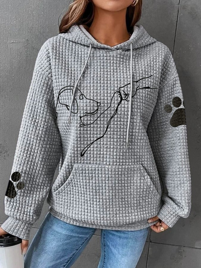 Women's relaxed-fit quilted hoodie with playful dog motif, cozy soft-touch fabric for casual wear
