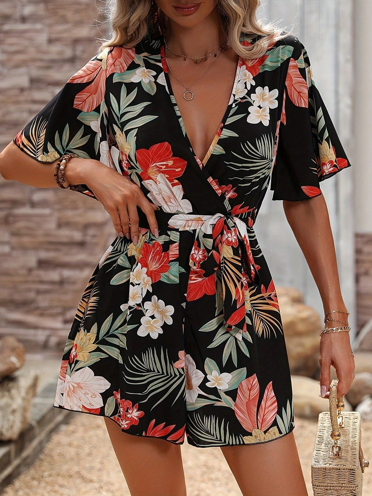 Women's floral print wrap V-neck cotton romper with ruffled sleeves and belted waist
