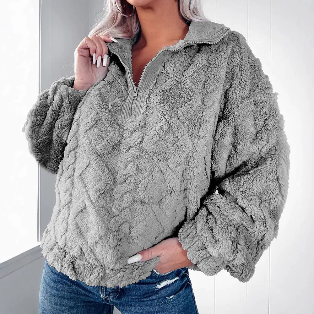 Women's relaxed-fit pullover sweater with soft faux fur quilted half-zip design for cozy warmth