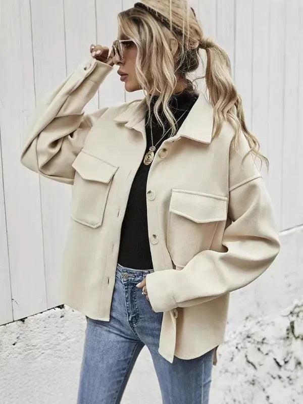 Women's oversized wool coat button-front notched collar with flap pockets in classic style
