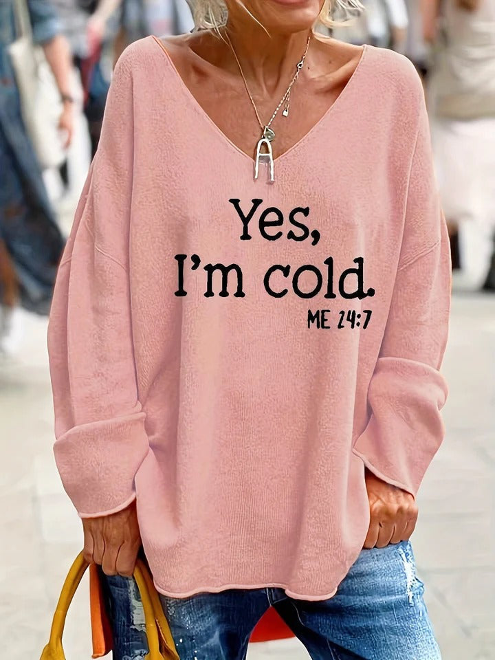 Women's soft knit oversized V-neck sweater with relaxed drop shoulders, casual everyday essential