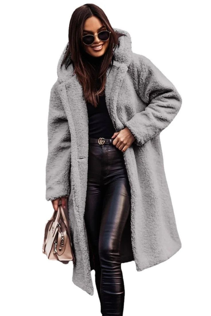 Women's oversized mid-length faux fur open-front jacket with plush texture in neutral tones
