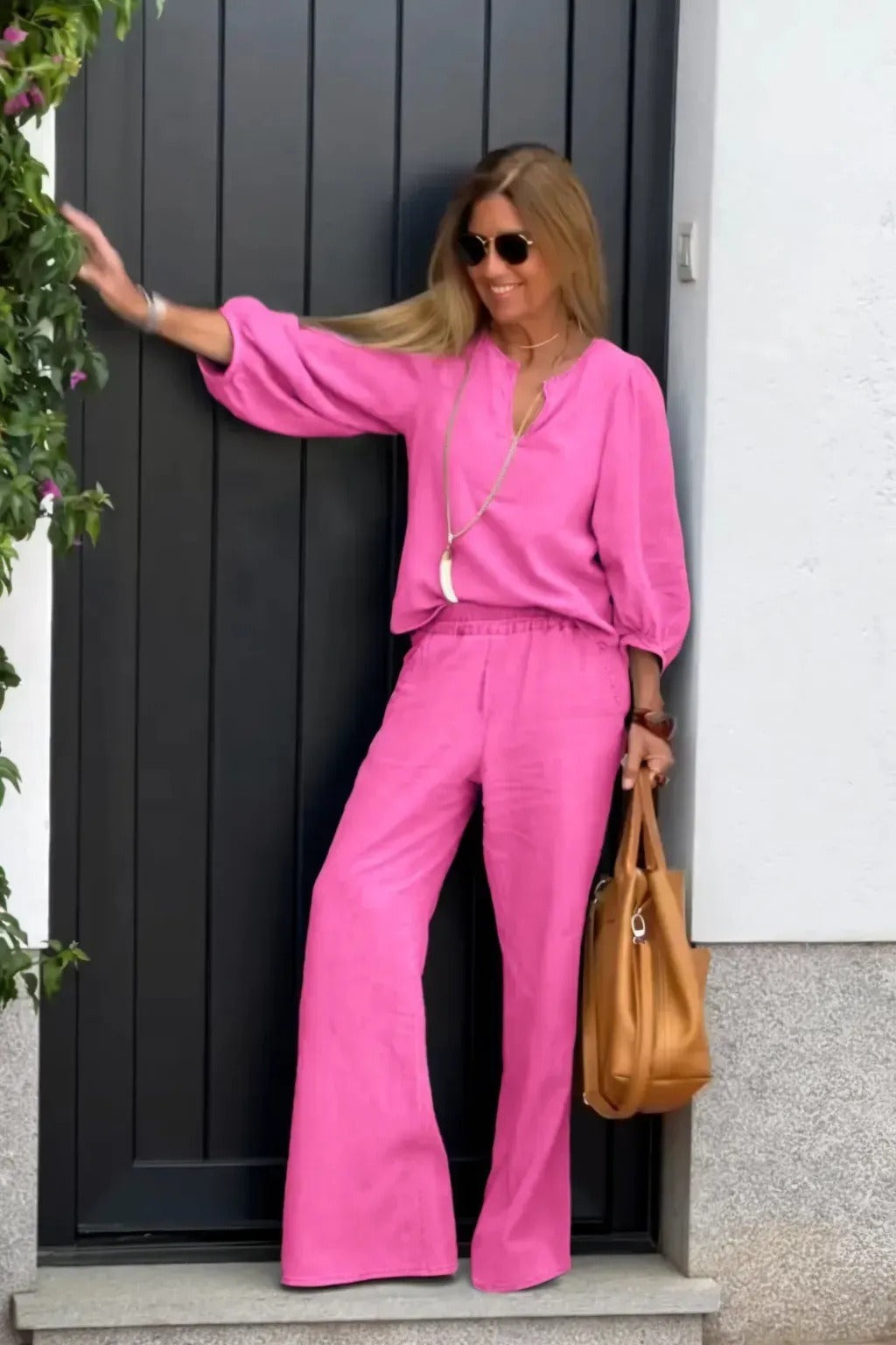 Women's relaxed-fit wide-leg jumpsuit with V-neck and three-quarter sleeves for everyday comfort