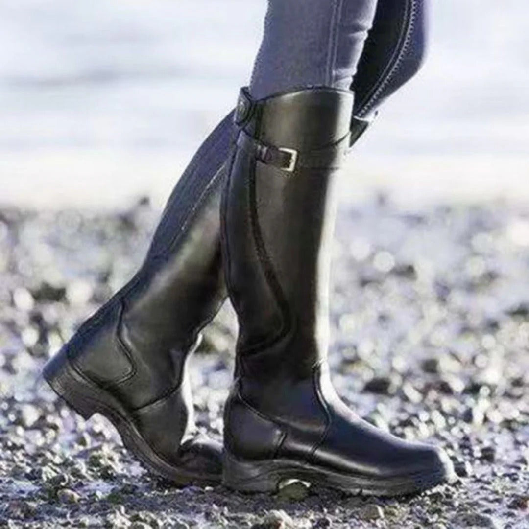 Women's brown leather equestrian riding boots with side zipper, waterproof construction and molded fit
