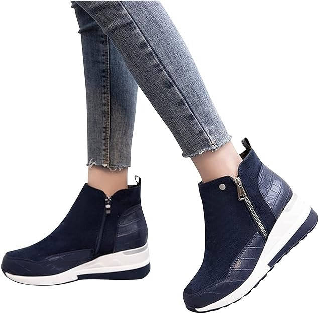 Women's black wedge sneaker boots with cushioned footbed, street-style silhouette, and supportive heel