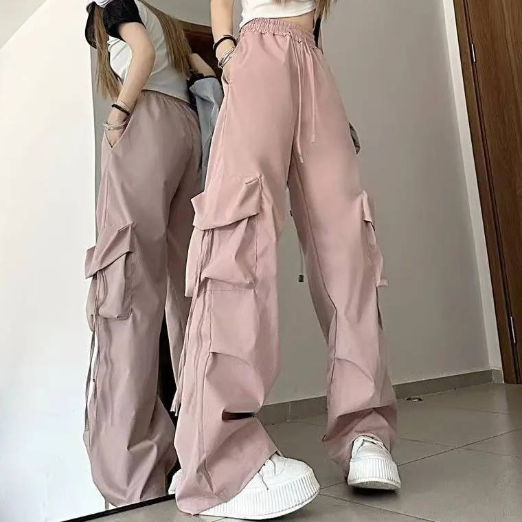 Women's loose fit cargo trousers in neutral tones, elastic drawstring waist, deep side pockets