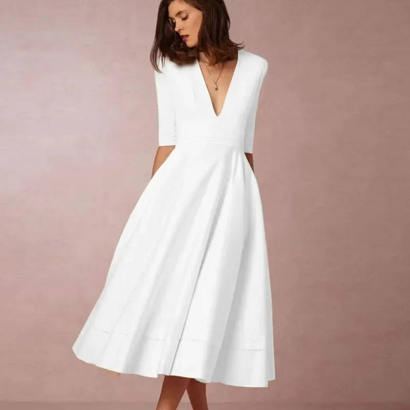 Women's elegant deep V-neck dress flattering fit versatile day-to-night style special occasions