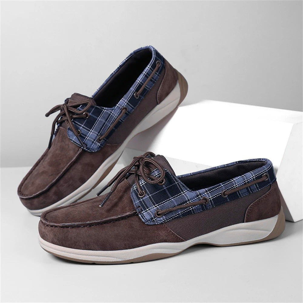Men's brown suede boat shoes with plaid fabric panels, classic moc-toe cut, all-day comfort flex outsole