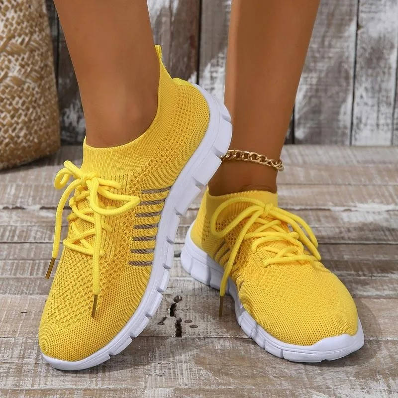 White breathable orthopedic nursing shoes with arch support and lightweight mesh upper