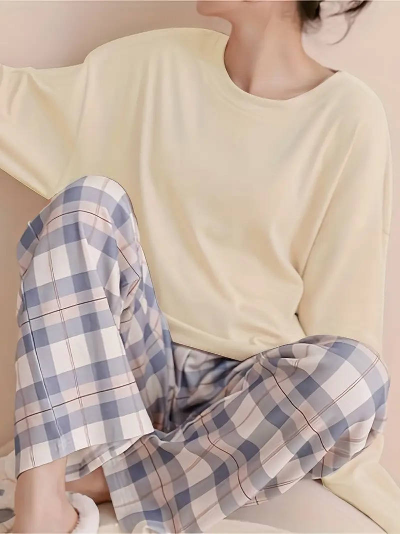 Women's plaid pajama set with loose tee and full-length pants, chic two-piece lounge wear